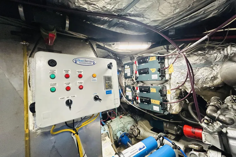  Yacht Photos Pics Engine room of 1992 Ferretti Yachts 45 Altura with control panel and wiring.