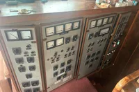 Control panel of a 1970 Custom Bootswerft Burmester 24 boat with gauges and switches.