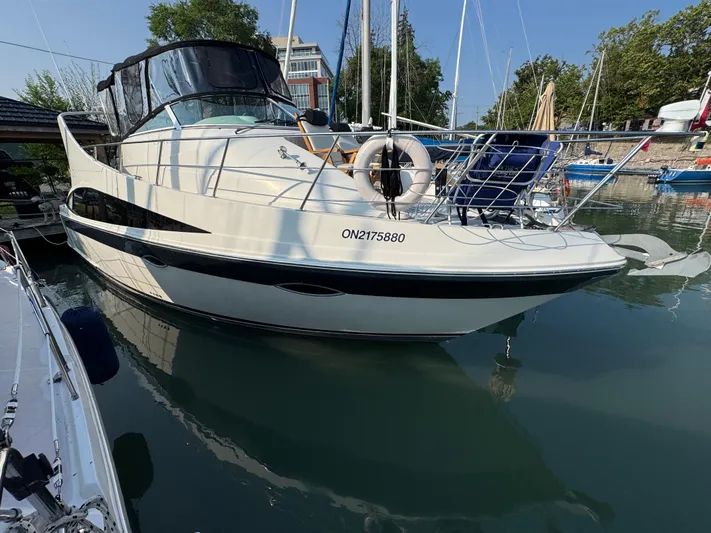  Yacht Photos Pics 2008 Carver 36 Mariner yacht docked in a marina, featuring sleek design and modern amenities.