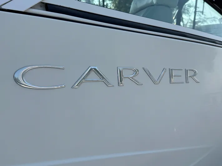  Yacht Photos Pics Carver 36 Mariner 2008 logo on white boat exterior.