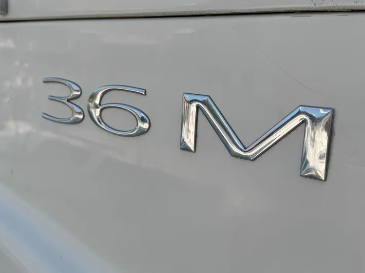  Yacht Photos Pics Chrome emblem on 2008 Carver 36 Mariner boat hull.