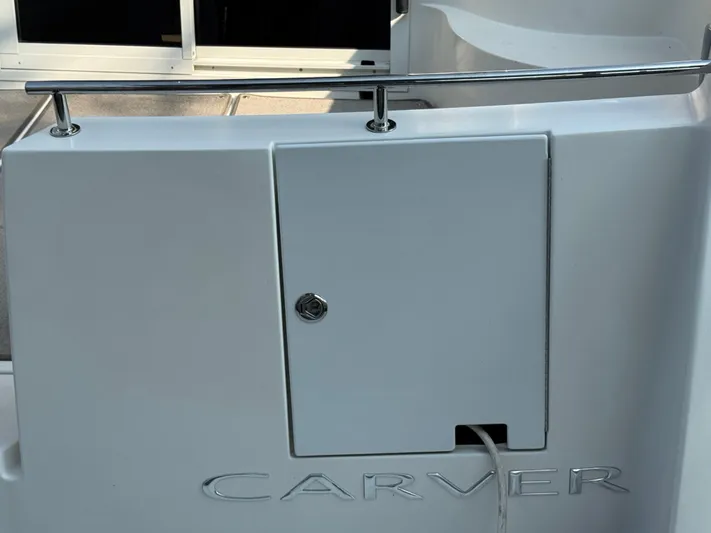  Yacht Photos Pics 2008 Carver 36 Mariner boat detail with railing and storage compartment.