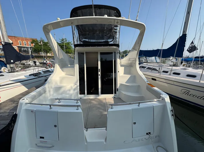  Yacht Photos Pics 2008 Carver 36 Mariner yacht docked, featuring spacious deck and sleek design.