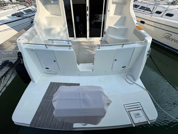  Yacht Photos Pics 2008 Carver 36 Mariner yacht stern view with swim platform and steps.