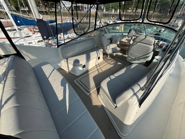  Yacht Photos Pics 2008 Carver 36 Mariner interior with spacious seating and helm, docked at marina.