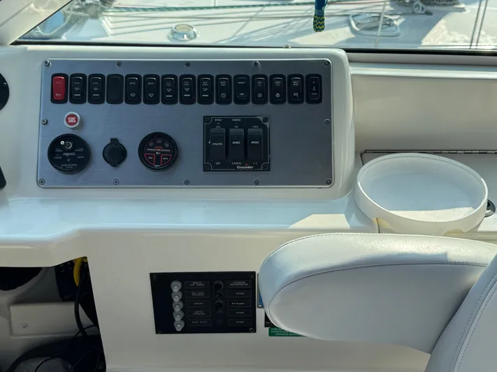  Yacht Photos Pics Control panel of 2008 Carver 36 Mariner boat with various switches and gauges.