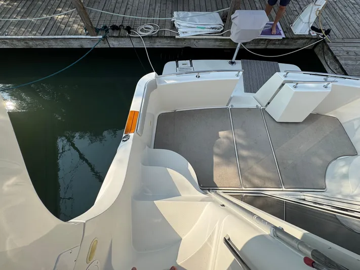  Yacht Photos Pics 2008 Carver 36 Mariner boat docked, showing deck and boarding area.