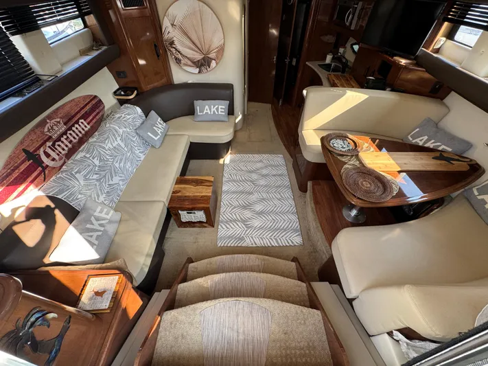  Yacht Photos Pics Interior of 2008 Carver 36 Mariner yacht with cozy seating and decorative pillows.