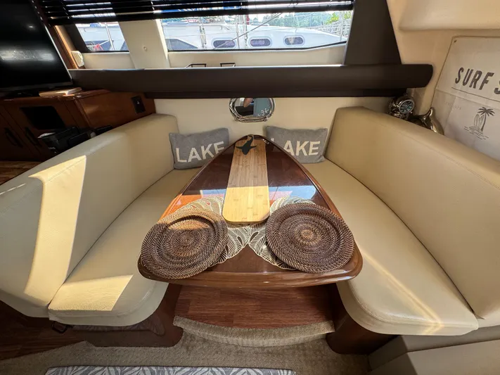  Yacht Photos Pics Interior of 2008 Carver 36 Mariner with cozy seating and decorative pillows.