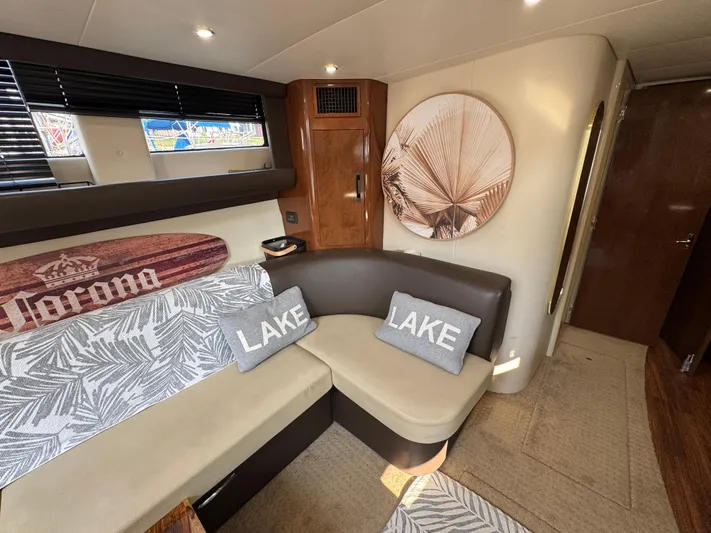  Yacht Photos Pics Interior of 2008 Carver 36 Mariner yacht with cozy seating and decorative pillows.