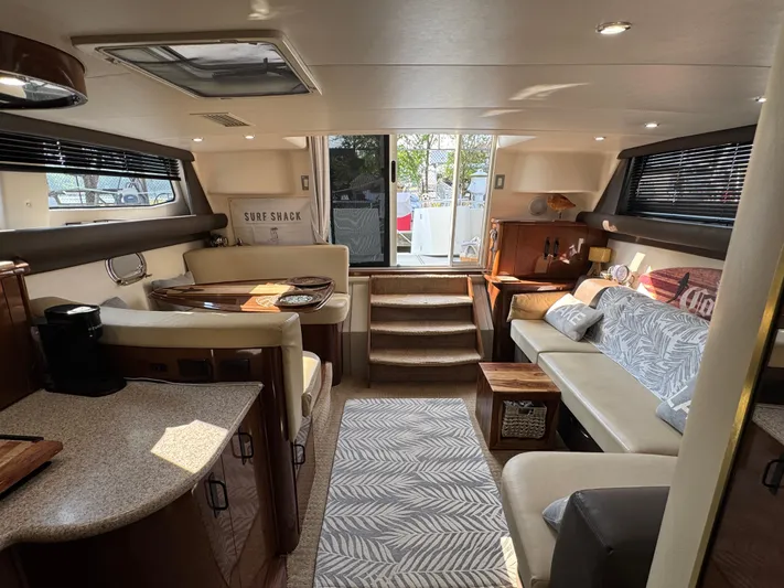  Yacht Photos Pics Luxurious interior of 2008 Carver 36 Mariner yacht with cozy seating and modern amenities.