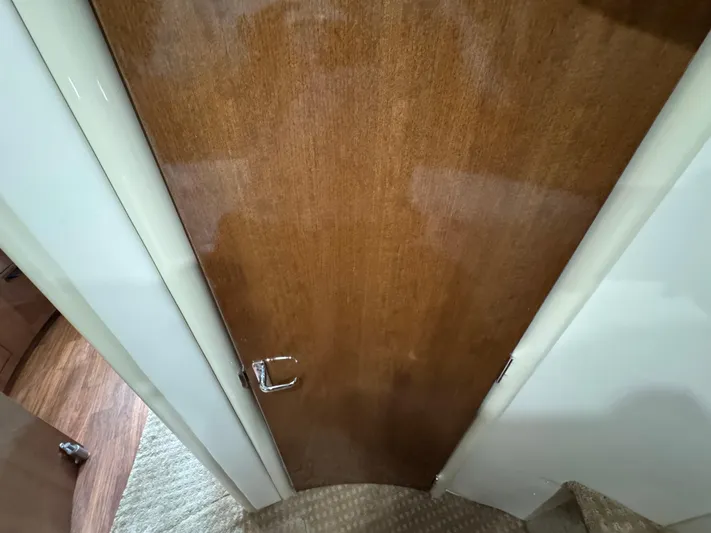  Yacht Photos Pics Wooden door inside 2008 Carver 36 Mariner yacht, featuring a chrome handle.