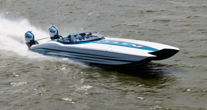  Yacht Photos Pics 2024 MTI 440X speedboat cruising on water with dual engines.