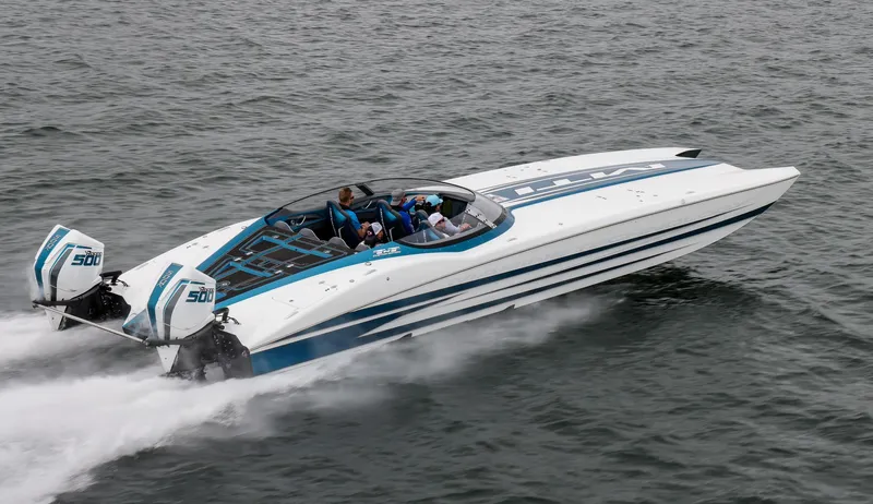  Yacht Photos Pics 2024 MTI 440X speedboat with dual engines cruising on water.