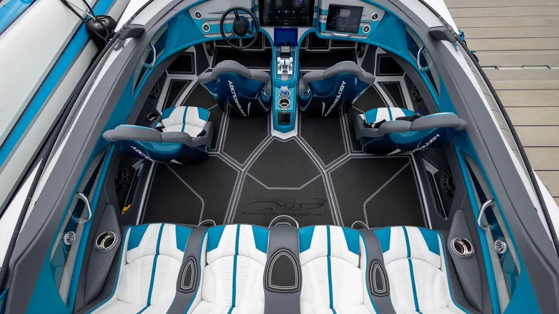  Yacht Photos Pics 2024 MTI 440X boat interior with modern seating and advanced dashboard controls.