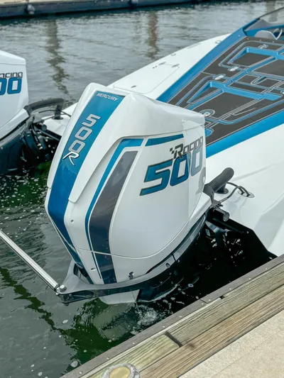  Yacht Photos Pics 2024 MTI 440X boat with twin 500R engines docked at marina.