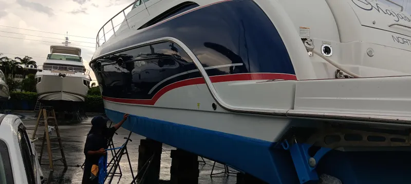 Majadero Yacht Photos Pics 2008 Formula 45 Yacht in dry dock, maintenance underway, overcast sky.