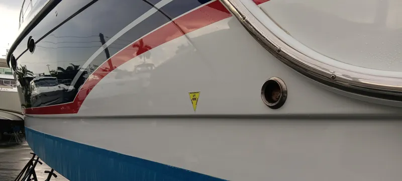 Majadero Yacht Photos Pics 2008 Formula 45 Yacht with sleek design and vibrant red, blue, and white accents.