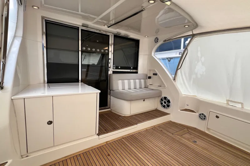 Yacht Photos Pics Interior of 2017 Riviera 445 SUV yacht with sleek seating and modern design.