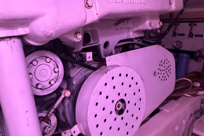 All In Yacht Photos Pics Engine components of a 1993 Viking 50 Convertible boat, featuring pulleys and belts.