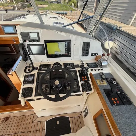  Yacht Photos Pics Cockpit of 1997 Little Harbor WhisperJet 46 with navigation equipment and steering wheel.