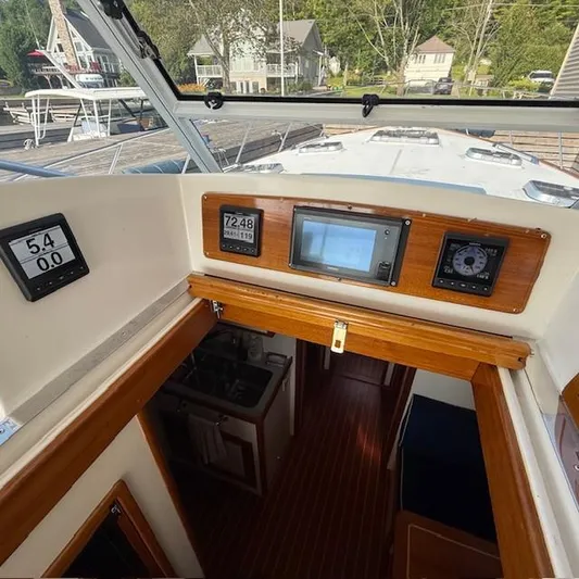  Yacht Photos Pics Interior view of 1997 Little Harbor WhisperJet 46 boat dashboard and cabin entrance.