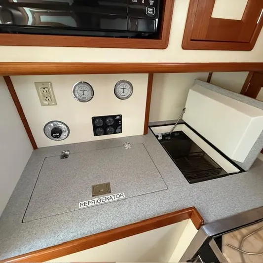  Yacht Photos Pics Little Harbor WhisperJet 46 yacht galley with refrigerator and control gauges, 1997 model.