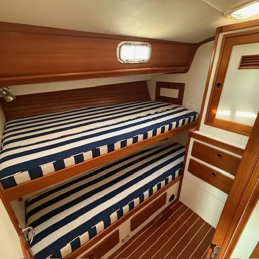  Yacht Photos Pics Cozy cabin with striped bunk beds in 1997 Little Harbor WhisperJet 46 yacht.