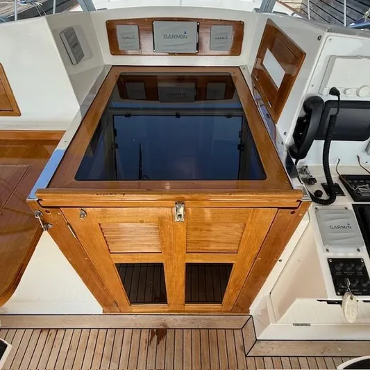  Yacht Photos Pics Wooden helm station of 1997 Little Harbor WhisperJet 46 with Garmin navigation equipment.