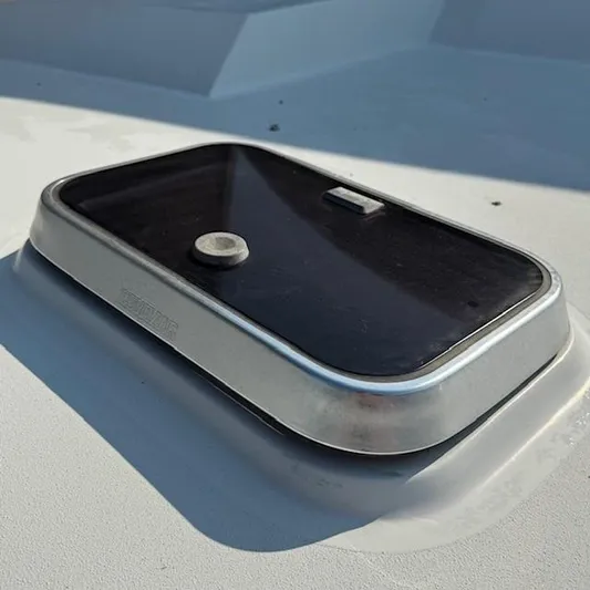  Yacht Photos Pics Hatch on 1997 Little Harbor WhisperJet 46 boat, featuring a sleek, metallic frame.