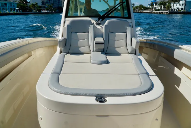 Af1 Yacht Photos Pics 2019 Scout 355 LXF boat with luxurious seating on open water.