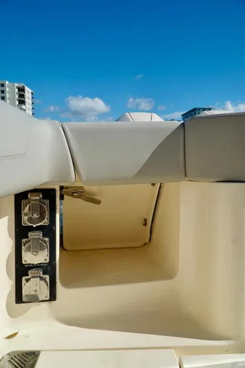 Af1 Yacht Photos Pics 2019 Scout 355 LXF boat storage compartment under clear blue sky.