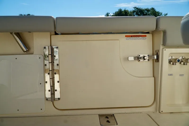 Af1 Yacht Photos Pics 2019 Scout 355 LXF boat interior with secure latch and hinge details.