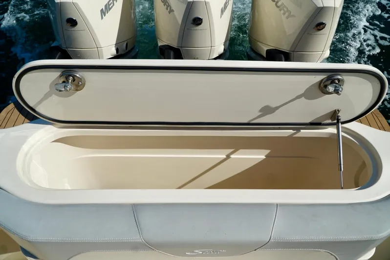 Af1 Yacht Photos Pics 2019 Scout 355 LXF boat with open storage compartment and triple Mercury engines.