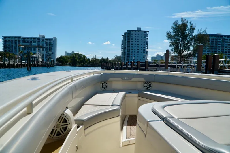 Af1 Yacht Photos Pics 2019 Scout 355 LXF boat interior with cityscape background, sunny day.