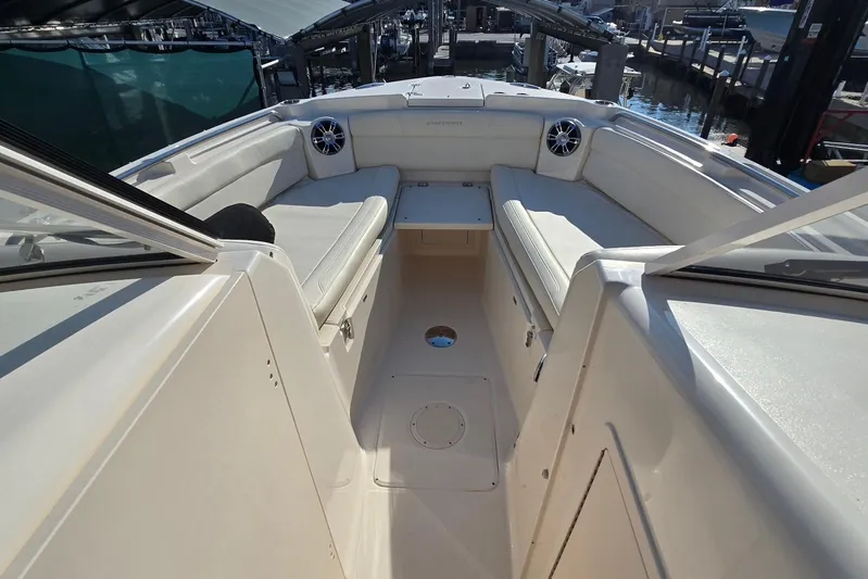  Yacht Photos Pics 2022 Grady-White Freedom 285 boat interior with spacious seating and modern design.