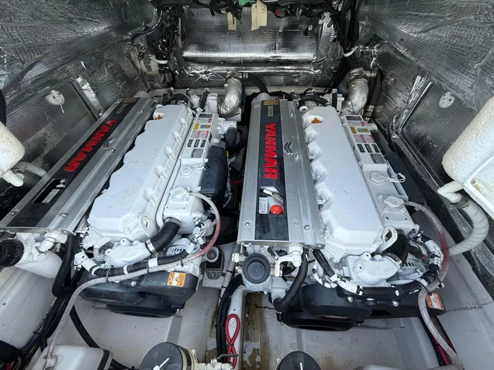  Yacht Photos Pics Twin Yanmar engines in a 2003 Strike 35 Cuddy boat engine room.