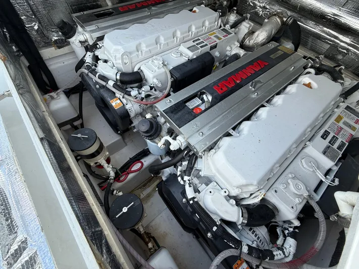  Yacht Photos Pics Twin Yanmar engines in a 2003 Strike 35 Cuddy boat engine compartment.