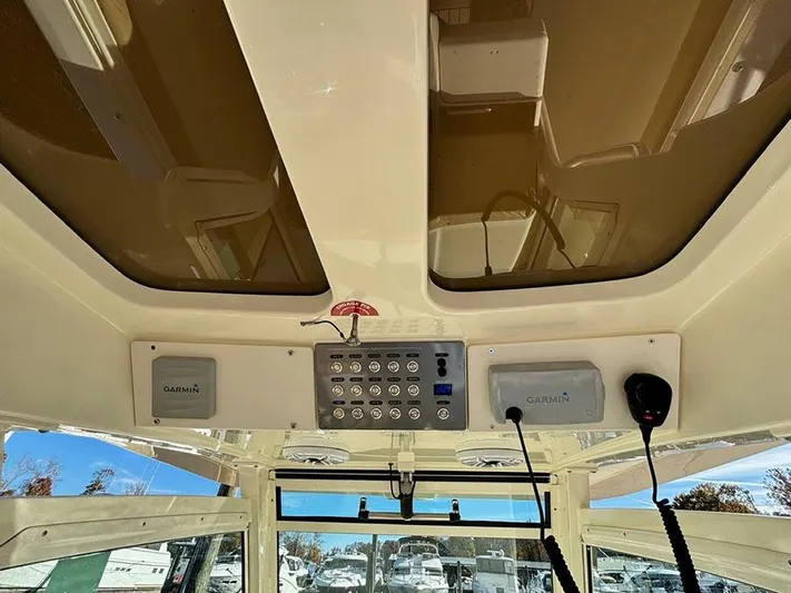  Yacht Photos Pics 2016 Scout 350 LXF boat interior with Garmin electronics and control panel.