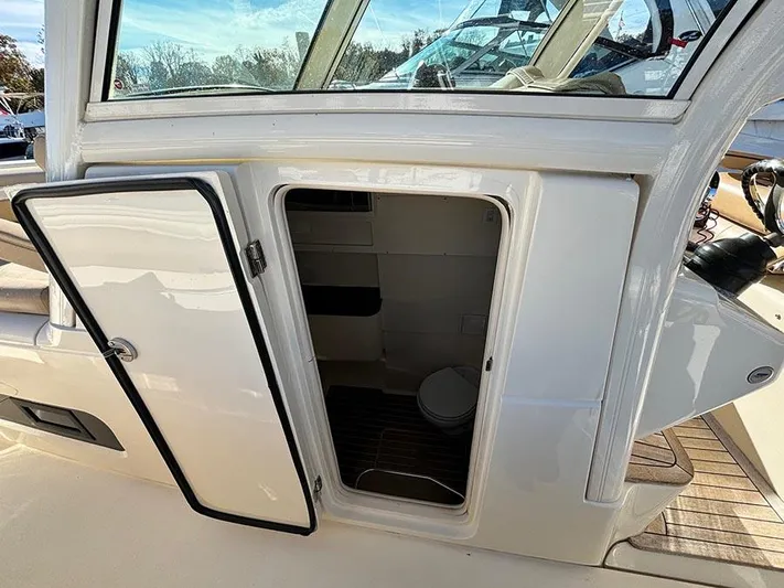  Yacht Photos Pics 2016 Scout 350 LXF boat interior with open cabin door.