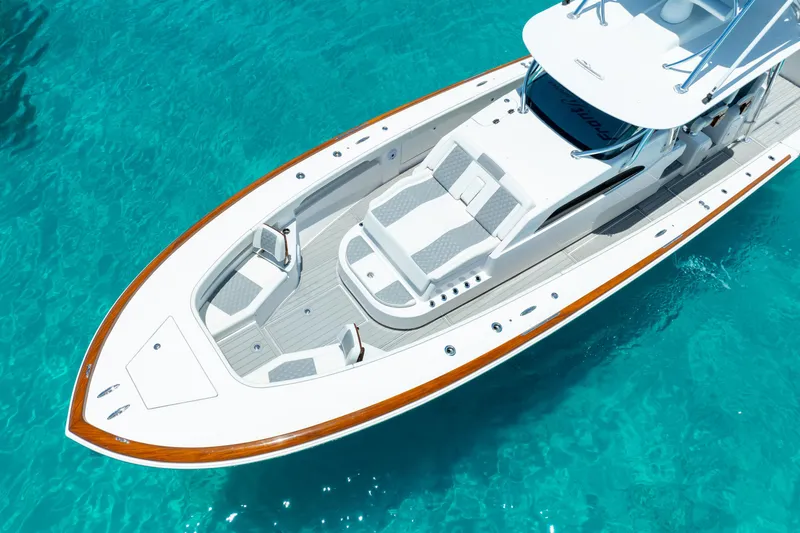  Yacht Photos Pics 2023 Front Runner 47 Center Console boat on clear blue water.