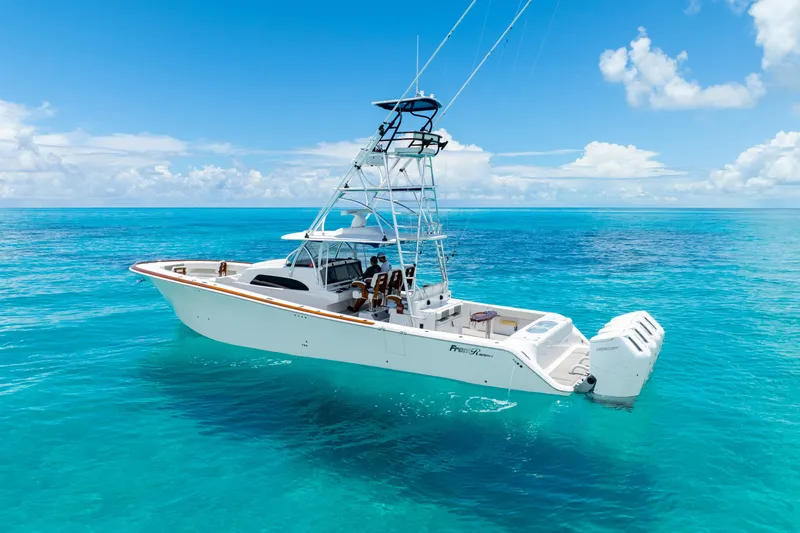  Yacht Photos Pics 2023 Front Runner 47 Center Console boat on clear blue ocean water.