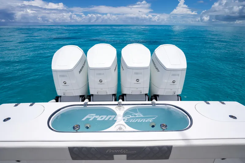  Yacht Photos Pics 2023 Front Runner 47 Center Console with four engines on turquoise ocean.