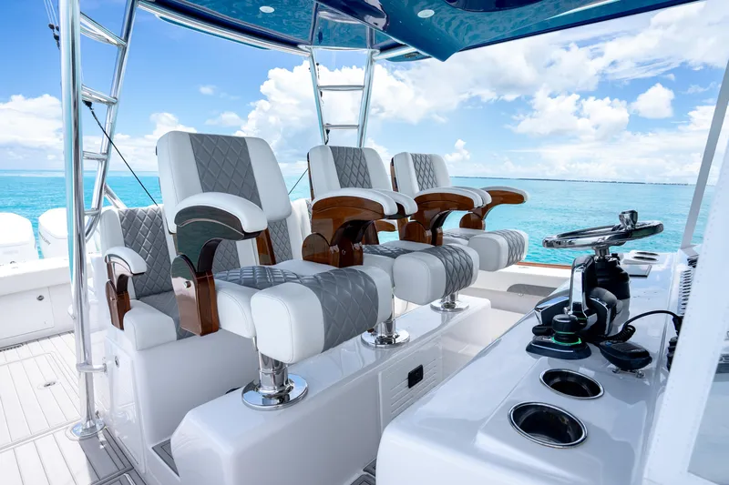  Yacht Photos Pics 2023 Front Runner 47 Center Console boat interior with luxurious seating and ocean view.
