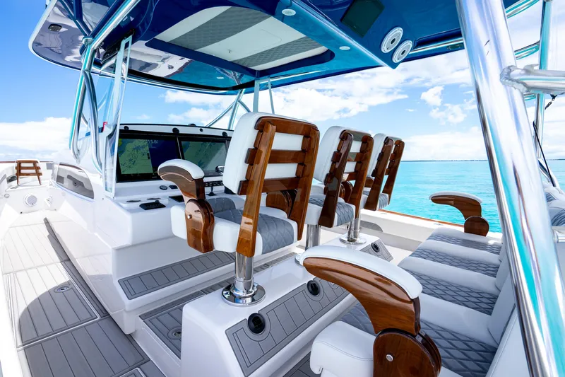  Yacht Photos Pics 2023 Front Runner 47 Center Console boat with luxurious seating and ocean view.