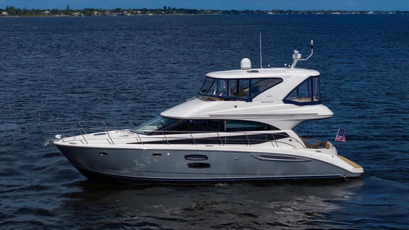 Gail’s Storm IV Yacht Photos Pics 2015 Meridian 441 Sedan yacht cruising on open water.