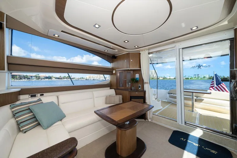Gail’s Storm IV Yacht Photos Pics Luxurious interior of 2015 Meridian 441 Sedan yacht with scenic water views.