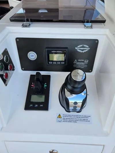 Tango Lima Yacht Photos Pics Control panel of 2022 Sunseeker 60 Predator EVO yacht with joystick and display.