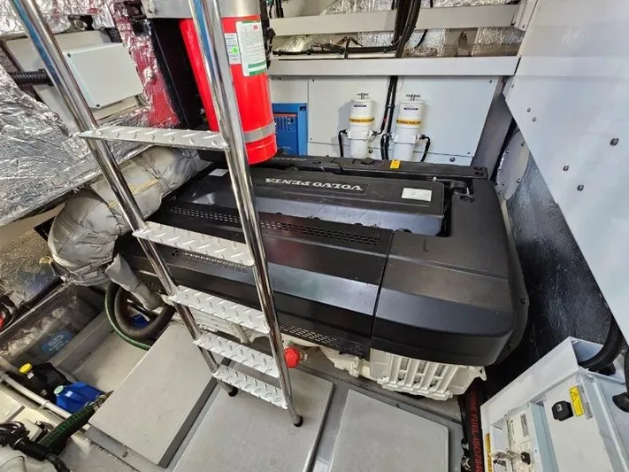 Tango Lima Yacht Photos Pics Engine room of 2022 Sunseeker 60 Predator EVO with Volvo Penta engine and safety equipment.