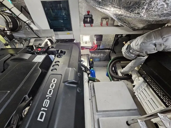 Tango Lima Yacht Photos Pics Engine room of 2022 Sunseeker 60 Predator EVO yacht, featuring D13-1000 engine.